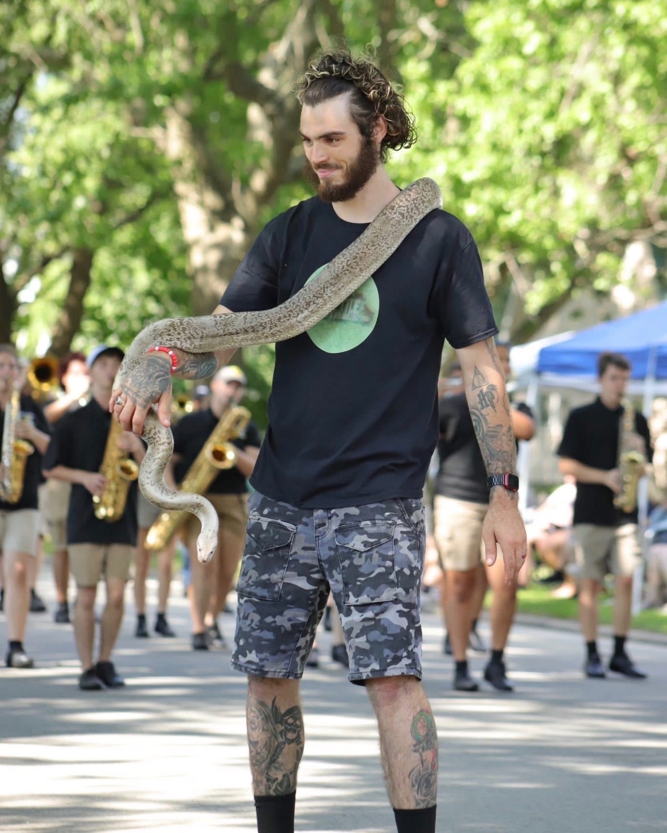 Niko holding one of his lizards.